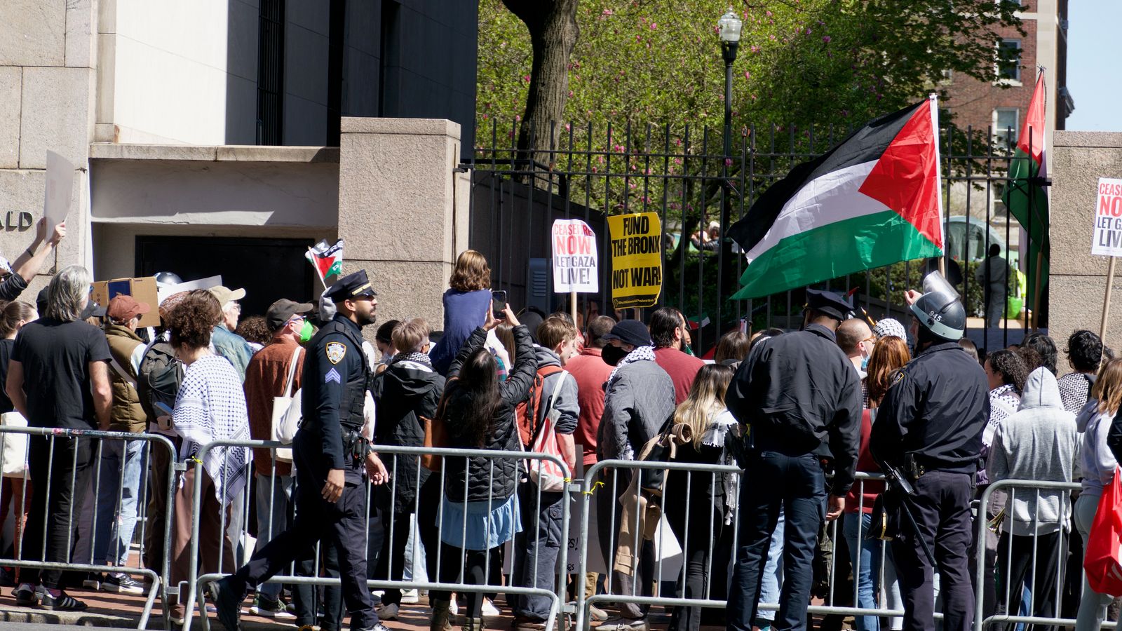 Pro-Palestinian demonstrators and police outside Columbia University in 2024